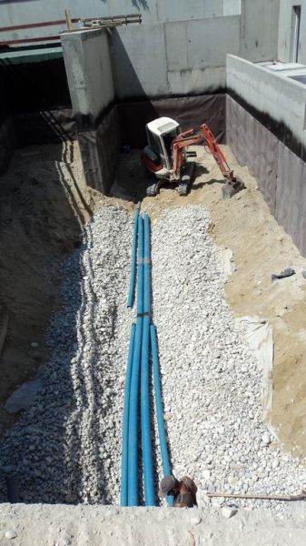 Pose des drains routiers